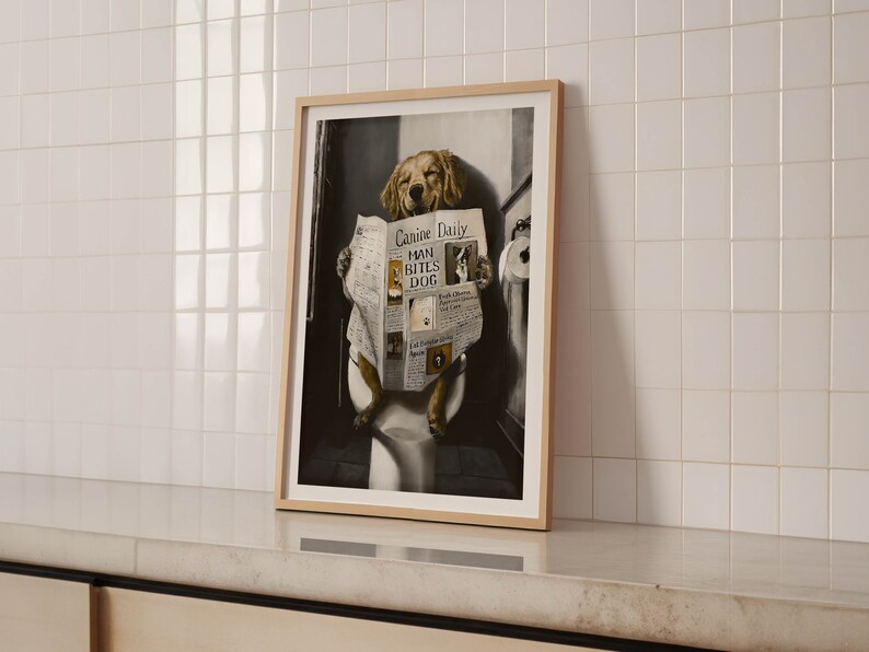 May include: A framed print of a golden retriever dog sitting on a toilet and reading a newspaper with the headline "Canine Daily: Man Bites Dog".