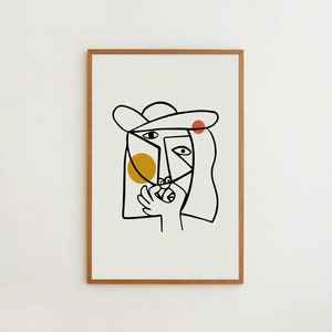 May include: A black and white line drawing of a person's face with a hat, a yellow circle, and a red circle.