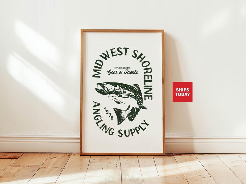 May include: A white poster with a green circle logo that says "Midwest Shoreline Angling Supply 1976" with the words "Superior Quality Gear & Tackle" inside the circle. The logo also features a black and white illustration of a fish jumping out of the water.