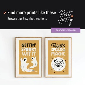May include: Two framed Halloween-themed art prints. One features ghosts and the phrase "Gettin' Spooky Wit It." The other says "Treats, Spells & Magic" with a moon face. The prints are on a mustard yellow background.