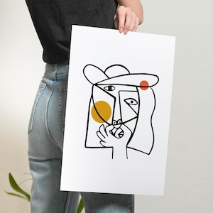 May include: A black and white line drawing of a person's face with a hat. The face has a yellow circle and a red circle on it.