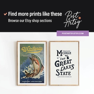 May include: Two vintage-style prints in wooden frames. The left print features a colorful illustration of a fish jumping out of the water with the text "Wildlands" above it. The right print features a blue and white graphic with the text "Michigan 76 The Great Lakes State Water Winter Wonderland".
