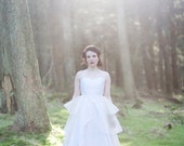 Full skirt, one shoulder wedding gown with layered organza