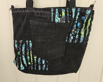 Tote bag, black denim, distressed.