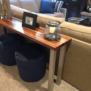 Pier Brushed Stainless Steel Post Table Legs under a wood plank top