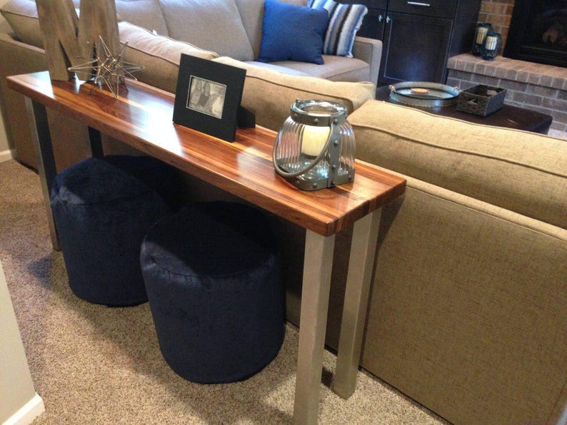 Pier Brushed Stainless Steel Post Table Legs under a wood plank top