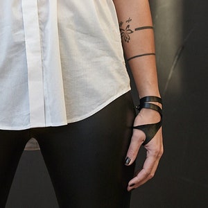 Leather wrap around thumb cuff wrist brace bracelet