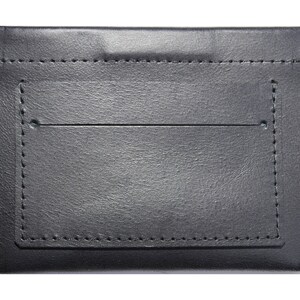 Pequeña cartera de cuero negro para efectivo y tarjetas de crédito