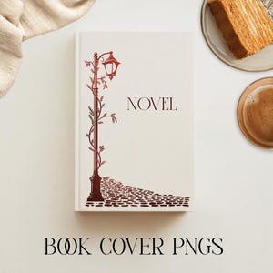 May include: A white hardback book featuring a dark red illustration of a vintage street lamp entwined with vines, positioned above a cobblestone path. The word NOVEL is printed in dark red capital letters on the right side of the cover.