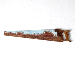 vintage folk art landscape painting on hand saw