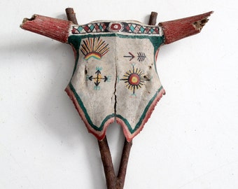 vintage western folk art, painted cow skull