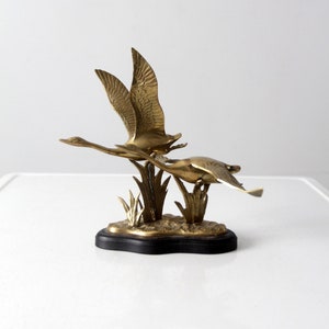 vintage flying brass birds sculpture