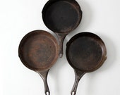 vintage cast iron skillets,  camp fire pan collection