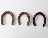 antique horseshoes / horse shoe collection of 3