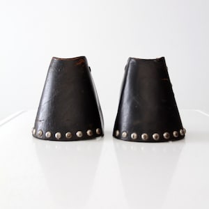 vintage tapaderos wall decor, western hooded stirrups