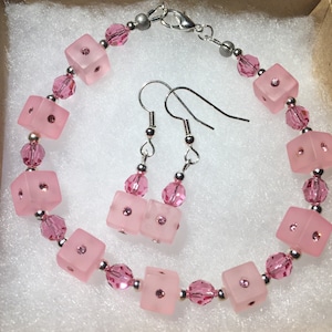 Rosa Swarovski Armband und Ohrringe set
