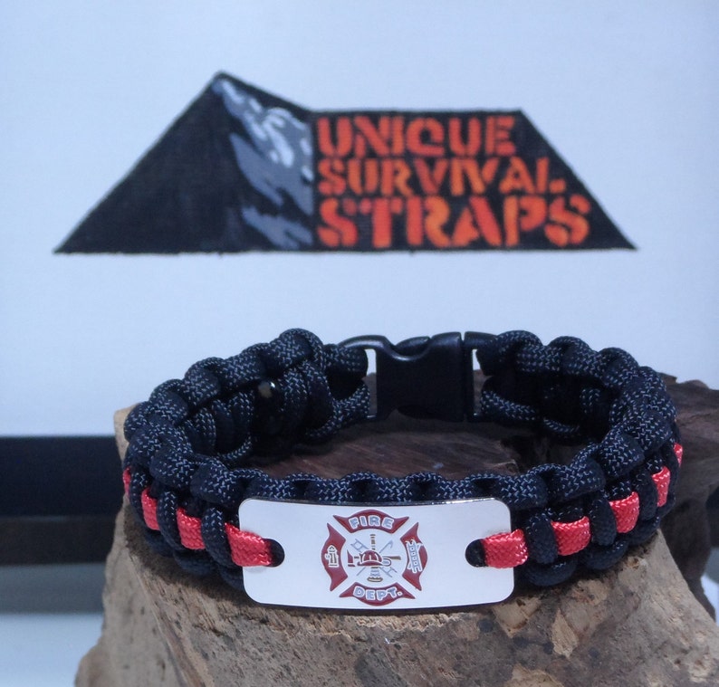 Thin Red line Fire fighter paracord bracelet with our large Fire Department emblem engraved stainless steel charm