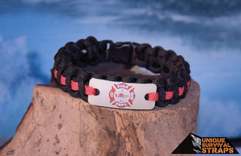 Thin Red line Fire fighter paracord bracelet with our large Fire Department emblem engraved stainless steel charm