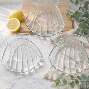 May include: A rustic wooden sign with the text "Welcome to our home" in white lettering. The sign features a distressed finish and a simple, inviting design, perfect for entryway decor.