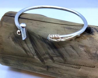 Sterling silver and 9 ct gold Polo Mallet bangle.