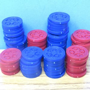 SEQUENCE Marker Chips, Included: 26 Blue and 18 Red Pieces