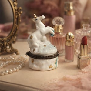 May include: A white ceramic mug with a black handle and the text "But First, Coffee" in a handwritten style. The mug is on a white surface. Perfect for coffee or tea.