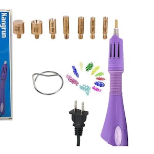 May include: Purple electric hot point drill with a variety of drill tips, a stand, and a power cord. The drill is labeled "Kangrun Hot Point Drill".