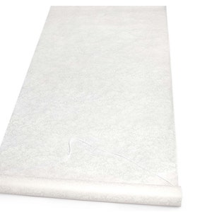 May include: A white, rolled-up aisle runner with a textured surface. The runner is made of a lightweight material and is perfect for weddings, parties, or other special events.