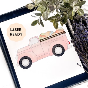 May include: A pink vintage truck illustration carrying Easter eggs in the bed. The truck has black wheels and a wooden fence. The image has the text "LASER READY" in a peach-coloured circle. The image is on a white background.