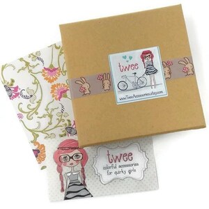 Photo shows a gift box with logo, business card, and thank you note card which will be included in all orders.