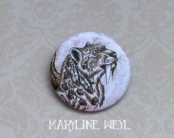 badge broche tigre à dent de sabre