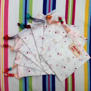 2 cotton pouches for storing baby teeth