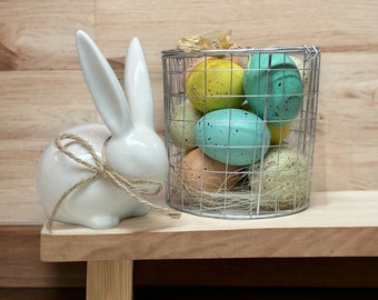 Easter Eggs in a Basket. Ceramic Bunny Rabbit.