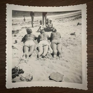 Vintage Snapshot Photo Women On Beach Sunbathing Backs To Camera Risque Pin Ups