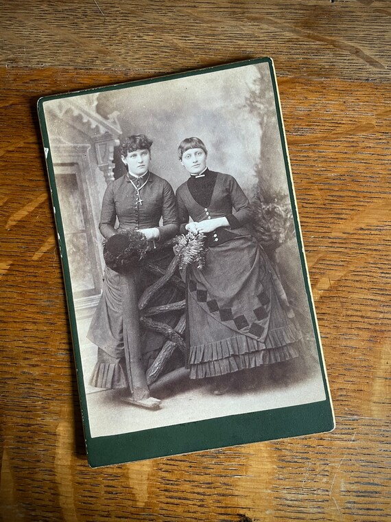 Tintype photo of two ladies dressed for the cold, late 1800s Tintype photo of two ladies dressed for the cold, late 1800s