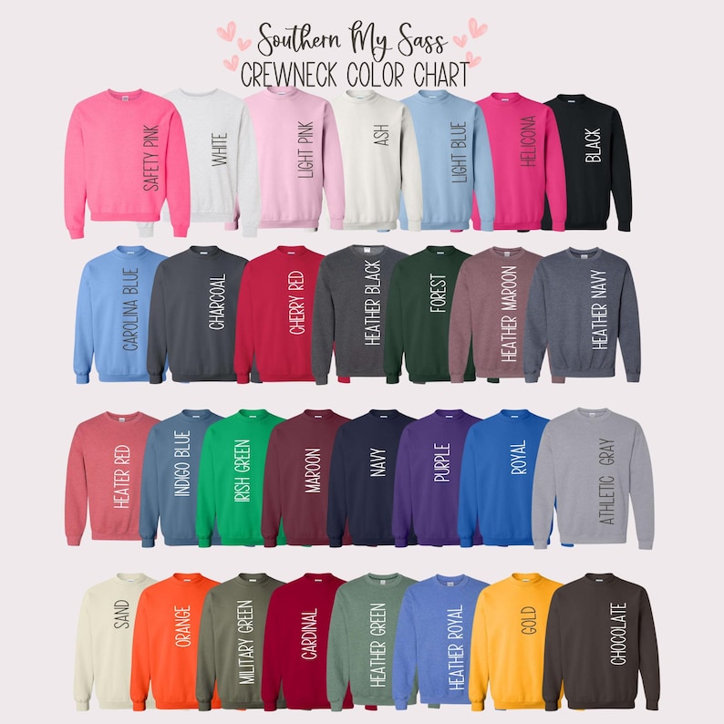 May include: A color chart of crewneck sweatshirts in various colors, including Safety Pink, White, Light Pink, Ash, Light Blue, Helicona, and Black. The chart also displays Carolina Blue, Charcoal, Cherry Red, Heather Black, Forest, and Heather Maroon.