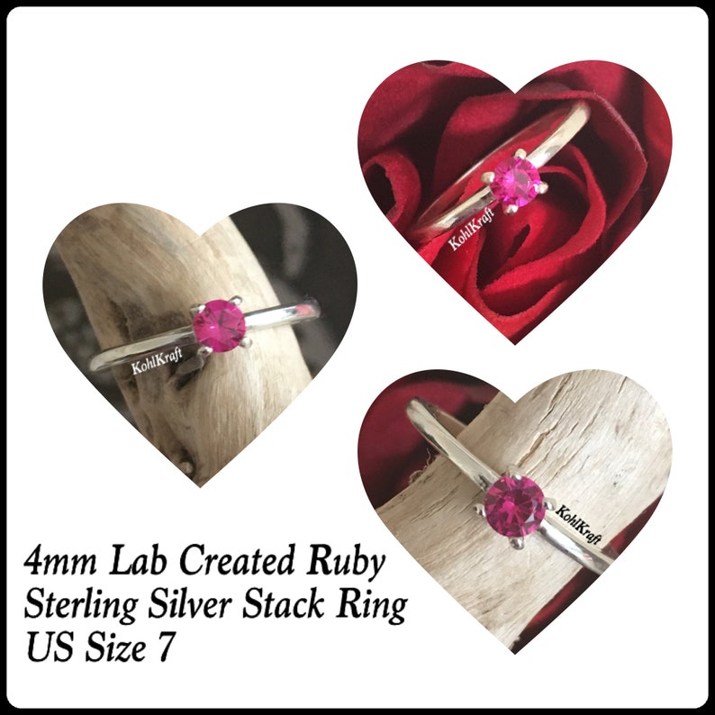 Op de afbeelding: Een 4 mm lab-gecre&euml;erde robijn sterling zilver stapelring in maat 7. De ring wordt getoond op een houten oppervlak en een rode roos.