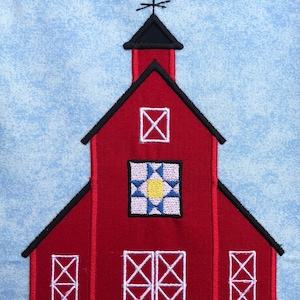 May include: Red barn with a white star on top and a white quilt block on the front. The barn has two white doors with a white X pattern.
