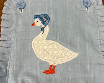 Goose mama applique embroidery design for use with an embroidery machine.