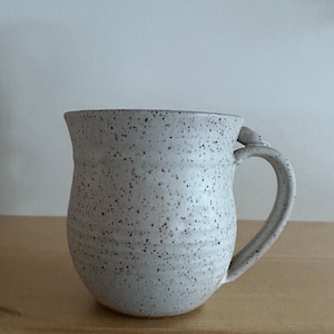 Satin white coffee mug cup with thumb rest