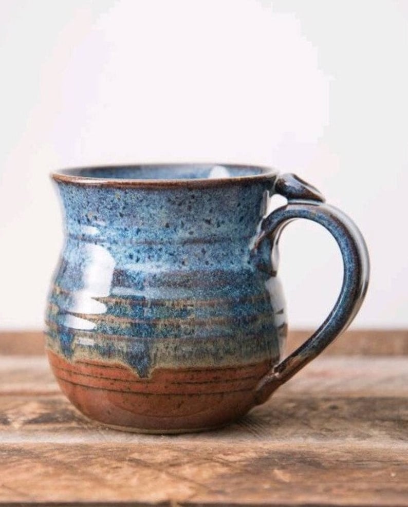 Blue and rust red hand thrown stoneware mug Clay Coffee cup thumb rest