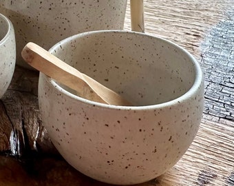 Small spice bowl with hand carved wooden spoon