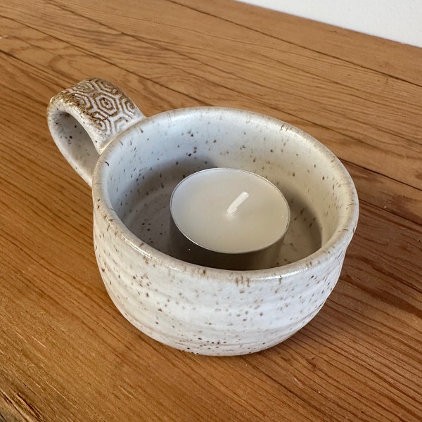 Small tea light candle holder with textured handle