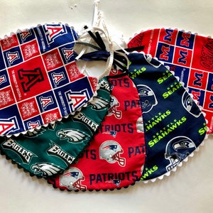 University of Arizona, Philadelphia Eagles,  New England Patriots, Seattle Seahawks, or University of Mississippi Toddler Bib