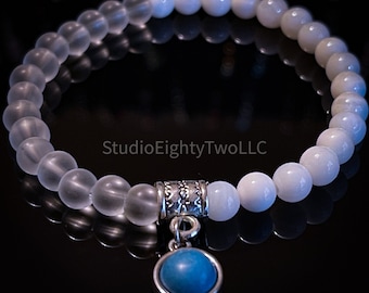 White and Frosted Clear Beaded Bracelet with Blue Charm