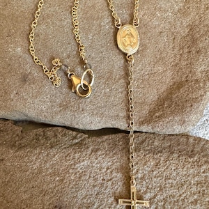 Gold rosary style necklace