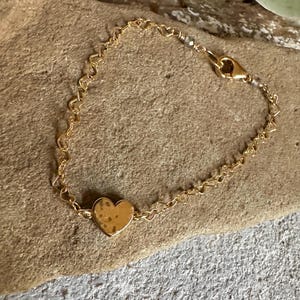 Heart charm gold bracelet