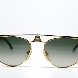 Lunettes de soleil vintage POLAROID AGORA occhiali da sole sonnebrille lunettes gafas de sol eyewear New Old Stock des années 1980