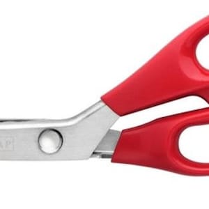 May include: Red handled pinking shears with a silver blade and the word "ZIPZAP" printed on the blade.