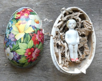 antique vintage paper mache easter egg with small bisque doll